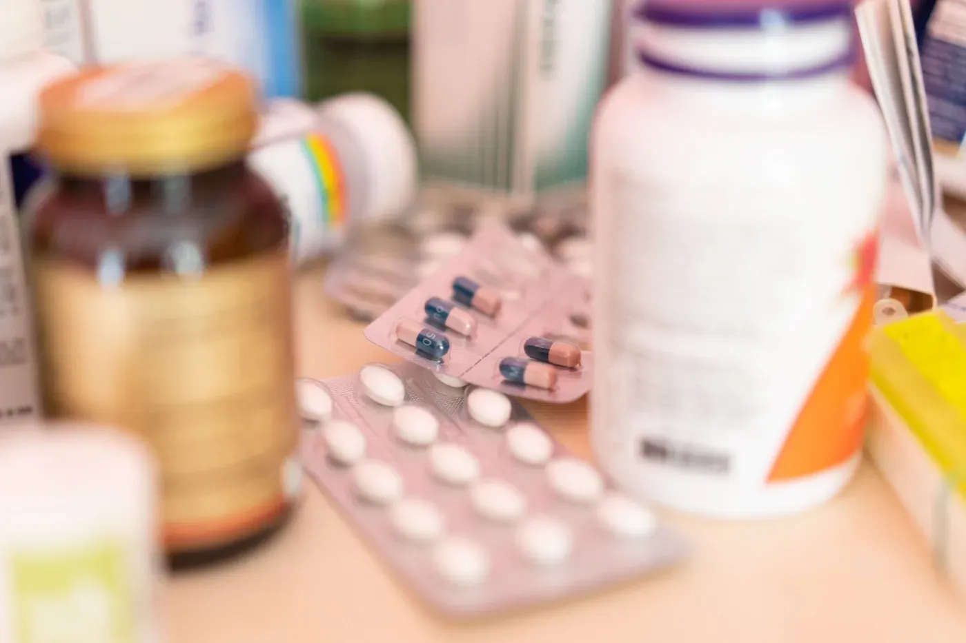 Medicine bottles and tablets on a counter
