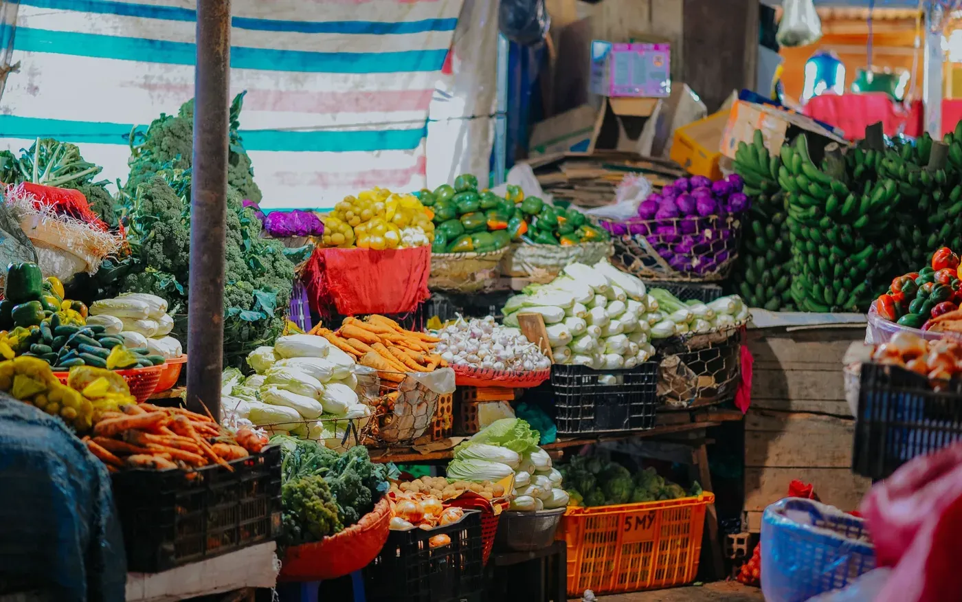 Onions and potatoes on a market stall